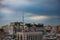 Yellow houses and roofs on the blue sky with light clouds. Birds-eye view the center of Moscow at sunset. Scape of the buildings