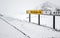 Yellow Icelandic road sign with direction