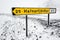 Yellow Icelandic road sign in snowy day