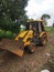 Yellow Indian JCB On Road On Soil