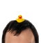 Yellow inflatable duck on head symbol of the Thai protests