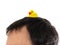 Yellow inflatable duck on head symbol of the Thai protests