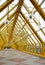 The yellow interior of the modern covered Andreevsky Pushkin bridge in Moscow city