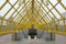 The yellow interior of the modern covered Andreevsky Pushkin bridge in Moscow city