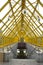 The yellow interior of the modern covered Andreevsky Pushkin bridge in Moscow city