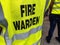Yellow jacket showing fire warden on duty.