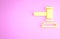 Yellow Judge gavel icon isolated on pink background. Gavel for adjudication of sentences and bills, court, justice