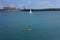 Yellow kayak and sailboat on the Harbour