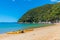 Yellow kayaks at Onetahuti beach at Abel Tasman national park in New Zealand