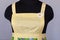 Yellow kitchen female apron on mannequin