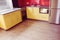 Yellow kitchen with soft sand grey laminate