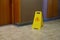 Yellow label warning of slippery floor