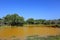 Yellow lake under blue sky