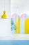 Yellow lamp, colorful wallpaper and plastic tube in a room inter