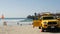 Yellow lifeguard car, beach near Los Angeles. Rescue Toyota pick up truck, lifesavers California USA