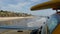 Yellow lifeguard car, ocean beach California USA. Rescue pick up truck, lifesavers vehicle.