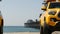 Yellow lifeguard car, ocean beach California USA. Rescue pick up truck, lifesavers vehicle.