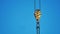 Yellow lifting crane hook blue sky background. crane hook construction concept lifestyle