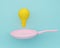 Yellow light bulbs with pan floating on blue color background. minimal business concept and food idea. An idea creative to produce