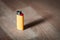 A yellow lighter in the floor