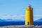 Yellow lighthouse and on a clear and sunny day