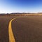 Yellow line on airport tarmac.