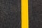 Yellow line on new asphalt detail