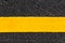 Yellow line on new asphalt detail