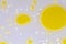 yellow liquid bubbles on white background, abstract chemical scientific background