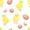 Yellow little chickens, eggs and broken shell seamless pattern. Vector illustration of cute chicks