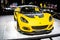 yellow Lotus Elise Cup 250 at Brussels Motor Show, two-seat, rear-wheel drive, mid-engined roadster produced by Lotus Cars