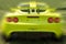Yellow Lotus Exige Sports Car Rear with Motion
