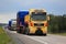 Yellow MAN V8 Semi Leads Wide Load Convoy