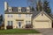 Yellow mansion home in a neighborhood Gresham Oregon