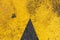 Yellow markings on surface of asphalt road