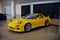 yellow Mazda RX-7 FD3S in car modification show