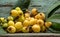 Yellow medlar fruits Eriobotrya japonica on aged wooden background