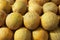 Yellow melon fruits market stacked rows