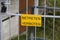 Yellow metal door sign - Do Not Enter