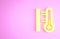 Yellow Meteorology thermometer measuring icon isolated on pink background. Thermometer equipment showing hot or cold