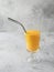Yellow milkshake with metal straws, sopy space