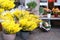 Yellow mimosa branches in buckets, spring bouquets, romantic flower baskets in a street flower shop, romantic shopping concept,