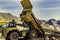 Yellow mining trucks at the Riotinto Mines under the sunlight at daytime in Huelva in Spain