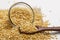 Yellow moong mung dal lentil pulse bean in glass bowl on white background