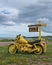 Yellow motorcycle along Cabot Trail