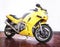 Yellow motorcycle in studio