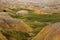 Yellow Mounds and Green Prairie Grass Badlands South Dakota