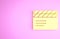 Yellow Movie clapper icon isolated on pink background. Film clapper board. Clapperboard sign. Cinema production or media