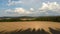 Yellow mowed wheat field, top view, drone concept video