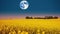 Yellow mustard field landscape industry of agriculture with full moon - Elements of this image furnished by NASA. Generative AI